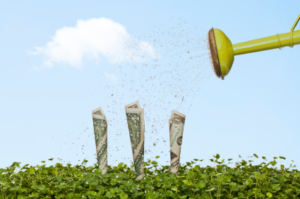 Watering can watering dollar bills